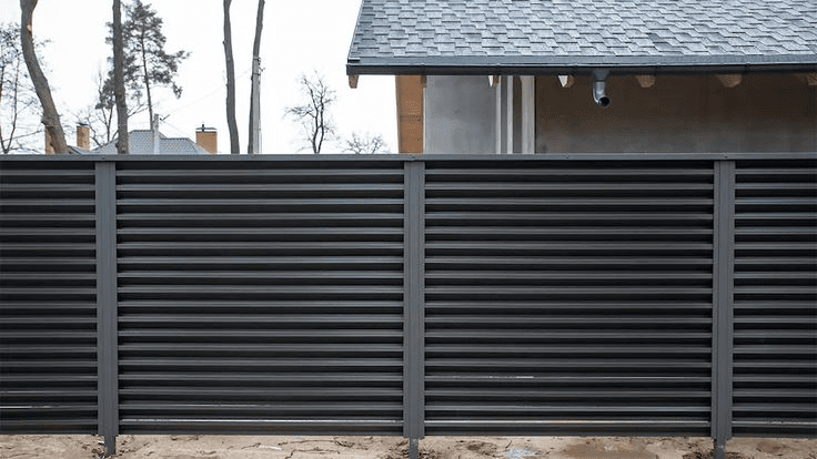 Dark aluminum louver fence