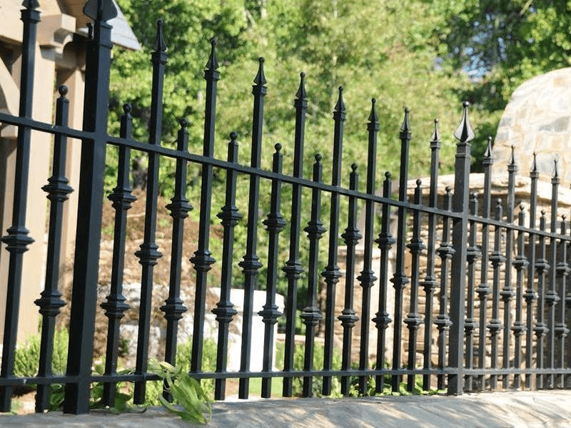 Wrought iron spear-top fence